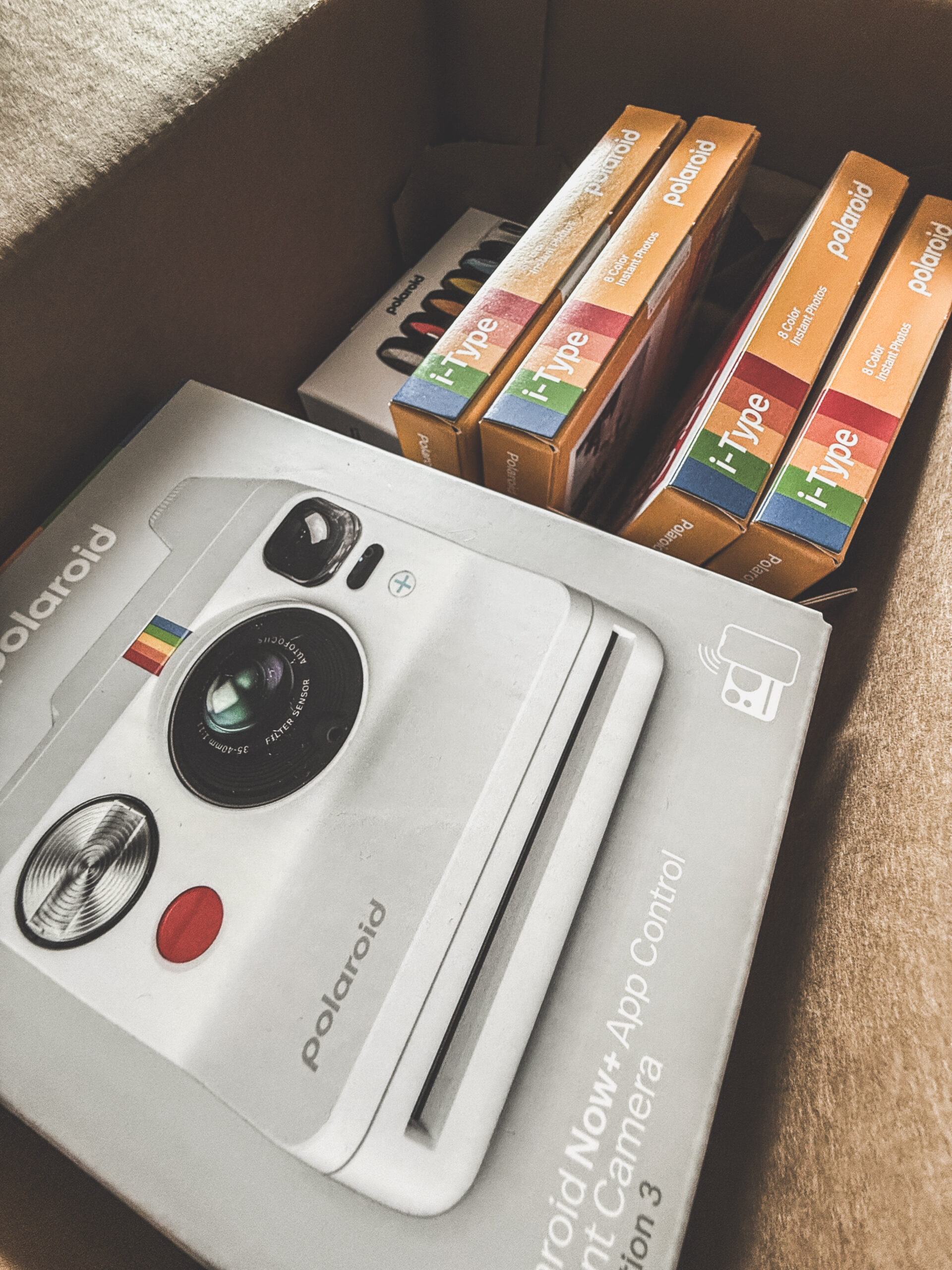 Polaroid Now+ camera, film, and filters